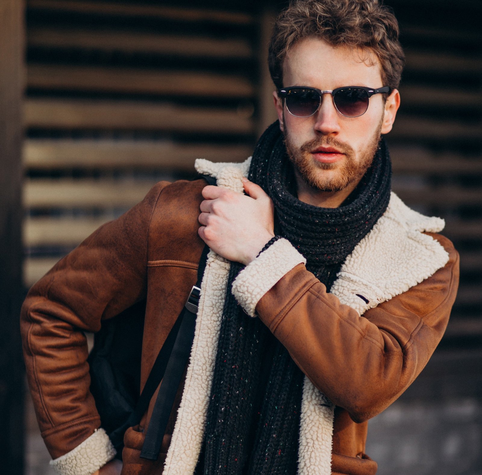Young handsome man in a street outfit